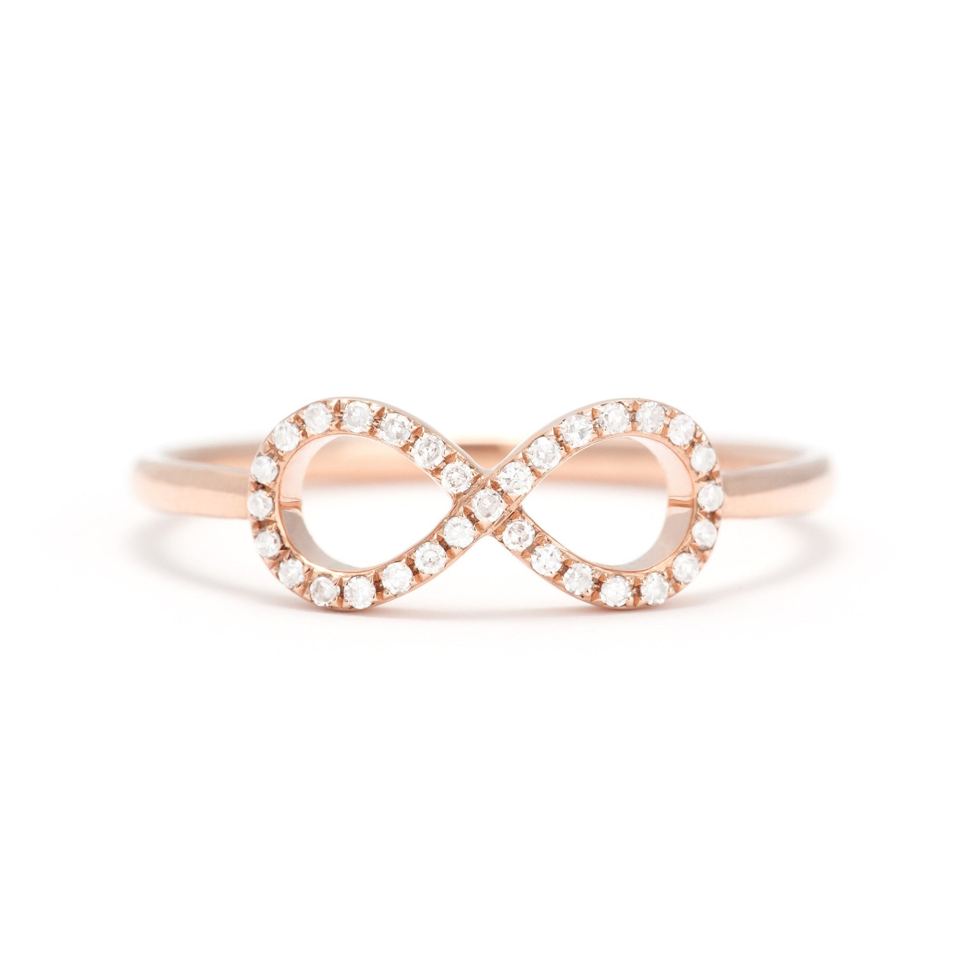 Gold and diamond infinity symbol stack ring